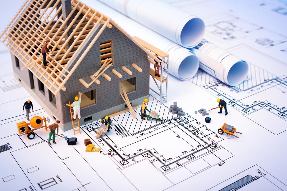 House under construction with council floor plans.