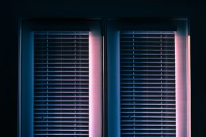 white window blinds closed